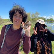 AXL 8th grade student holding a bullsnake he found on the overnight trip